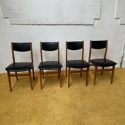 4 Scandinavian chairs in teak and black faux leather.