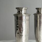 Pair of single-flower vases in patinated silver metal