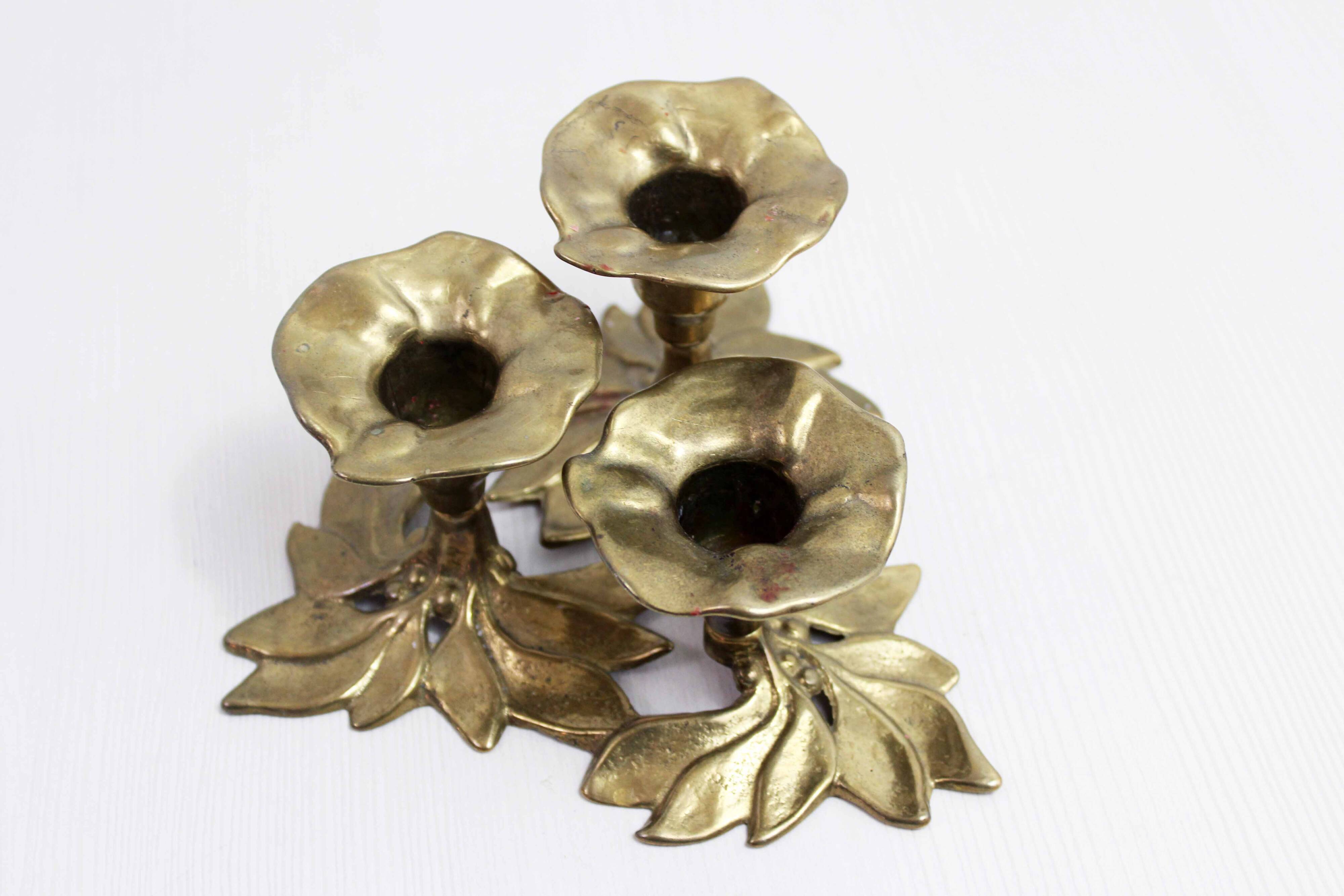 Brass flower candle holder