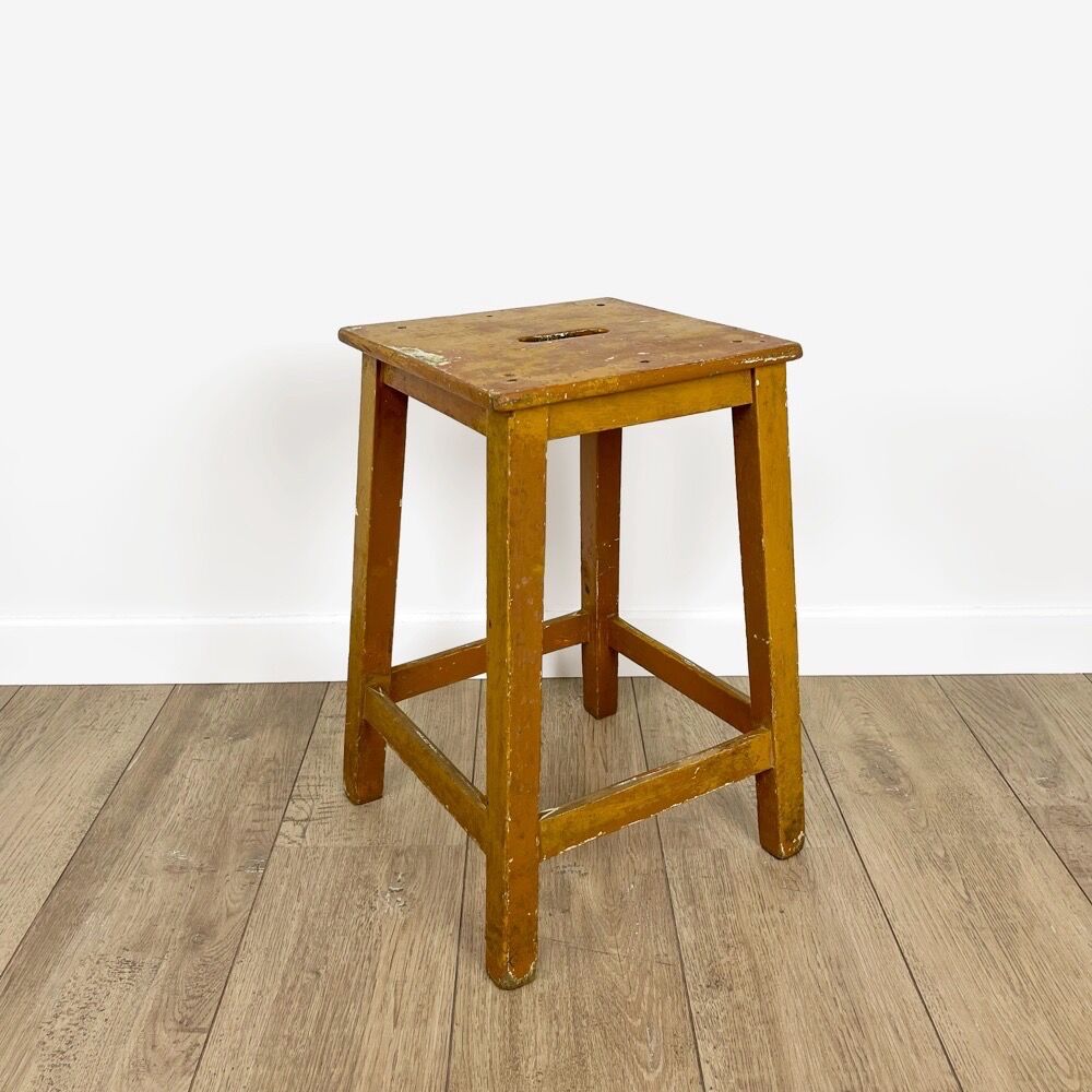 Old slotted milking stool