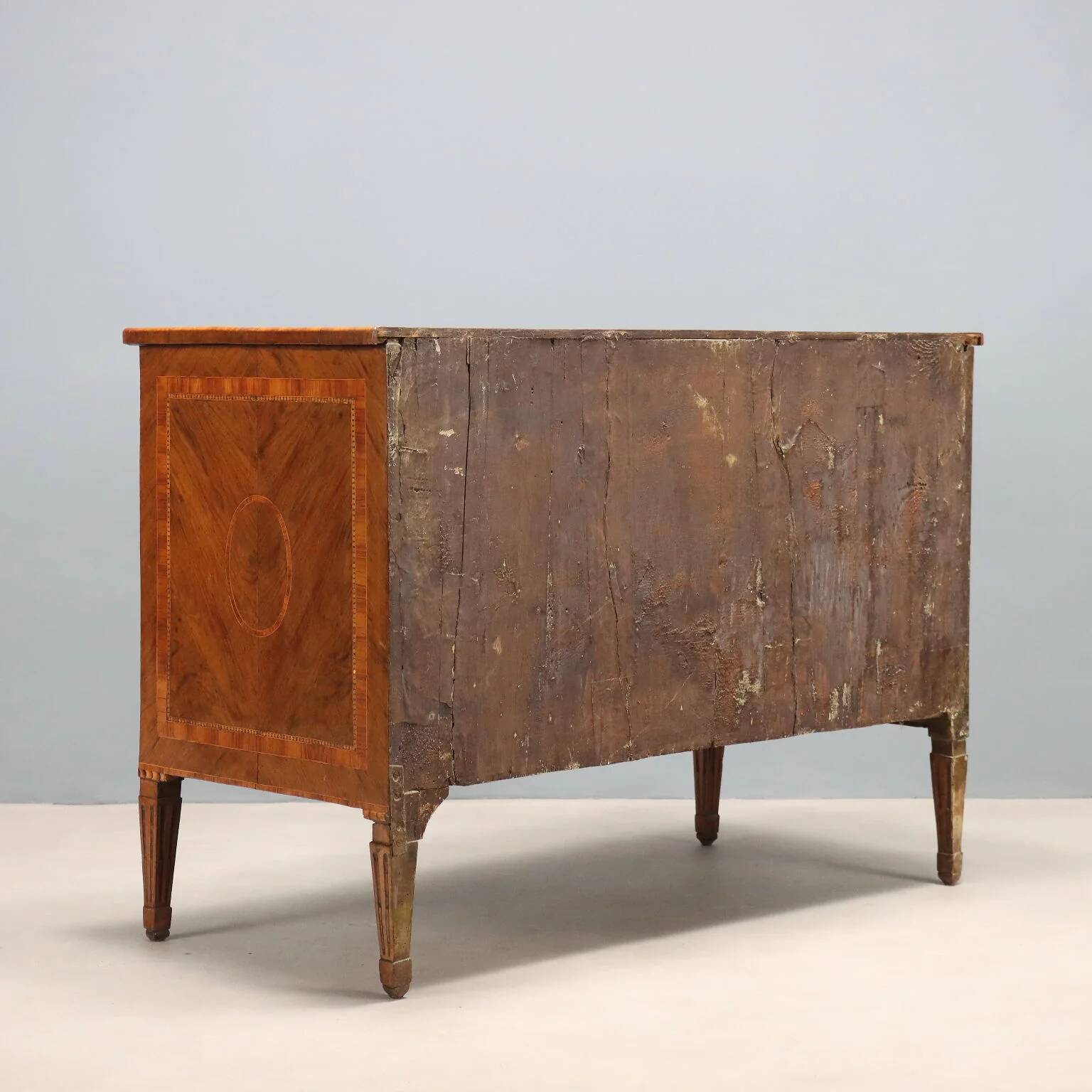 Antique neoclassical walnut commode from the 18th century.