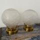 Pair of new electrified Art Deco globe sconces
