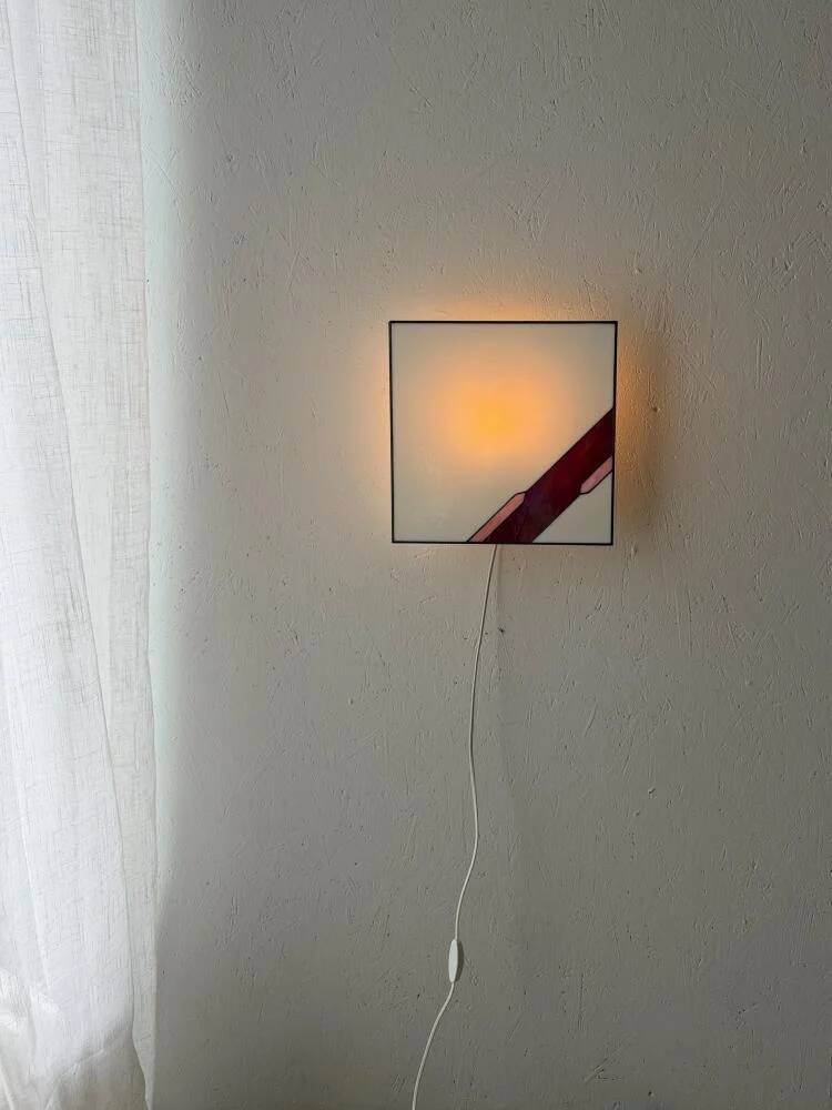 Architectural stained glass wall lamp with textured glass