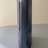 Sleek shaped pitcher in blue shaded ceramic. Signed under the base Stocker Fred and Andrée