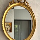 Gilded mirror with pediment