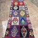 Vintage Boucherouite hallway rug: handwoven Berber rug