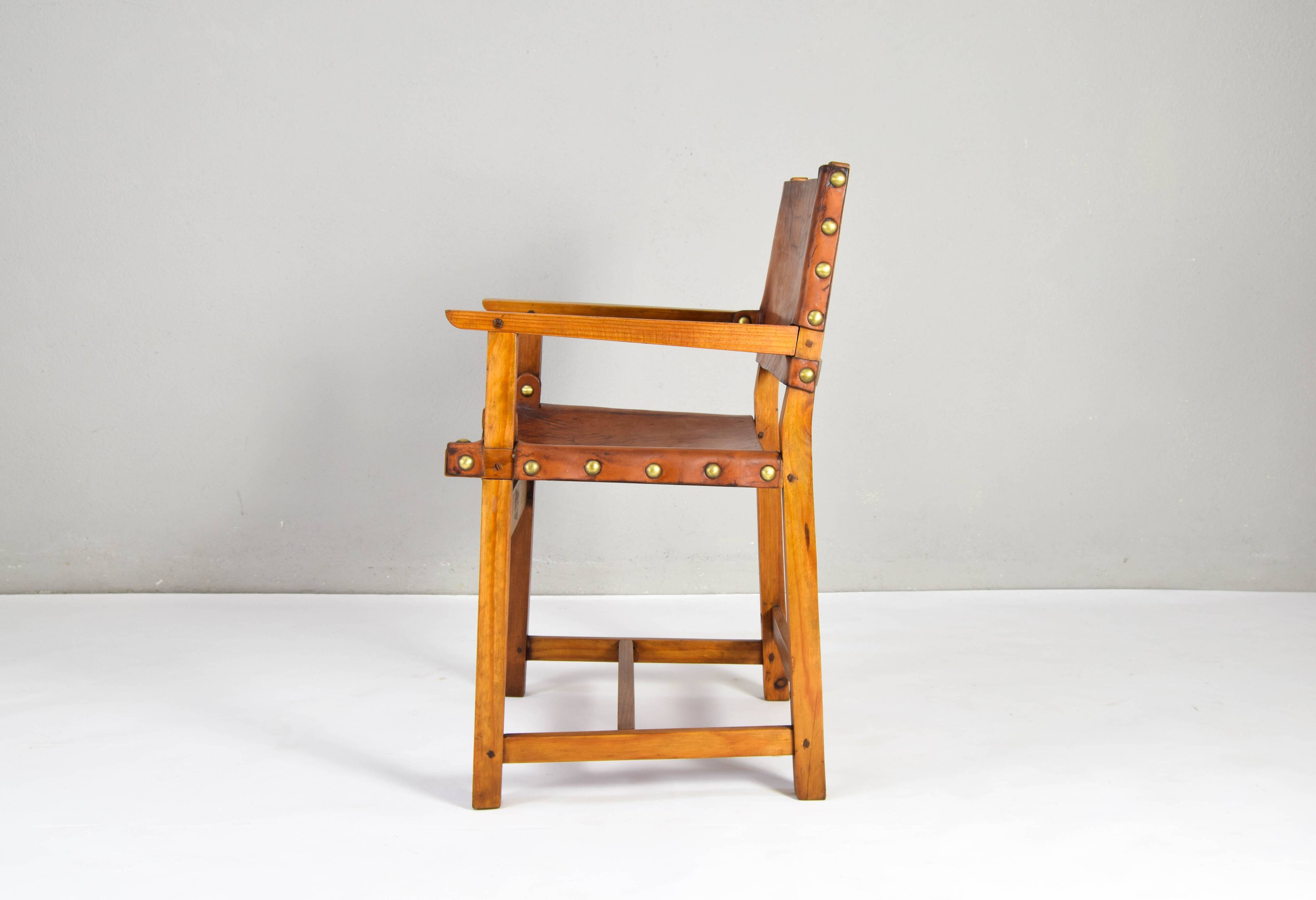 19th century oak and cognac leather brutalist castellana spanish armchair