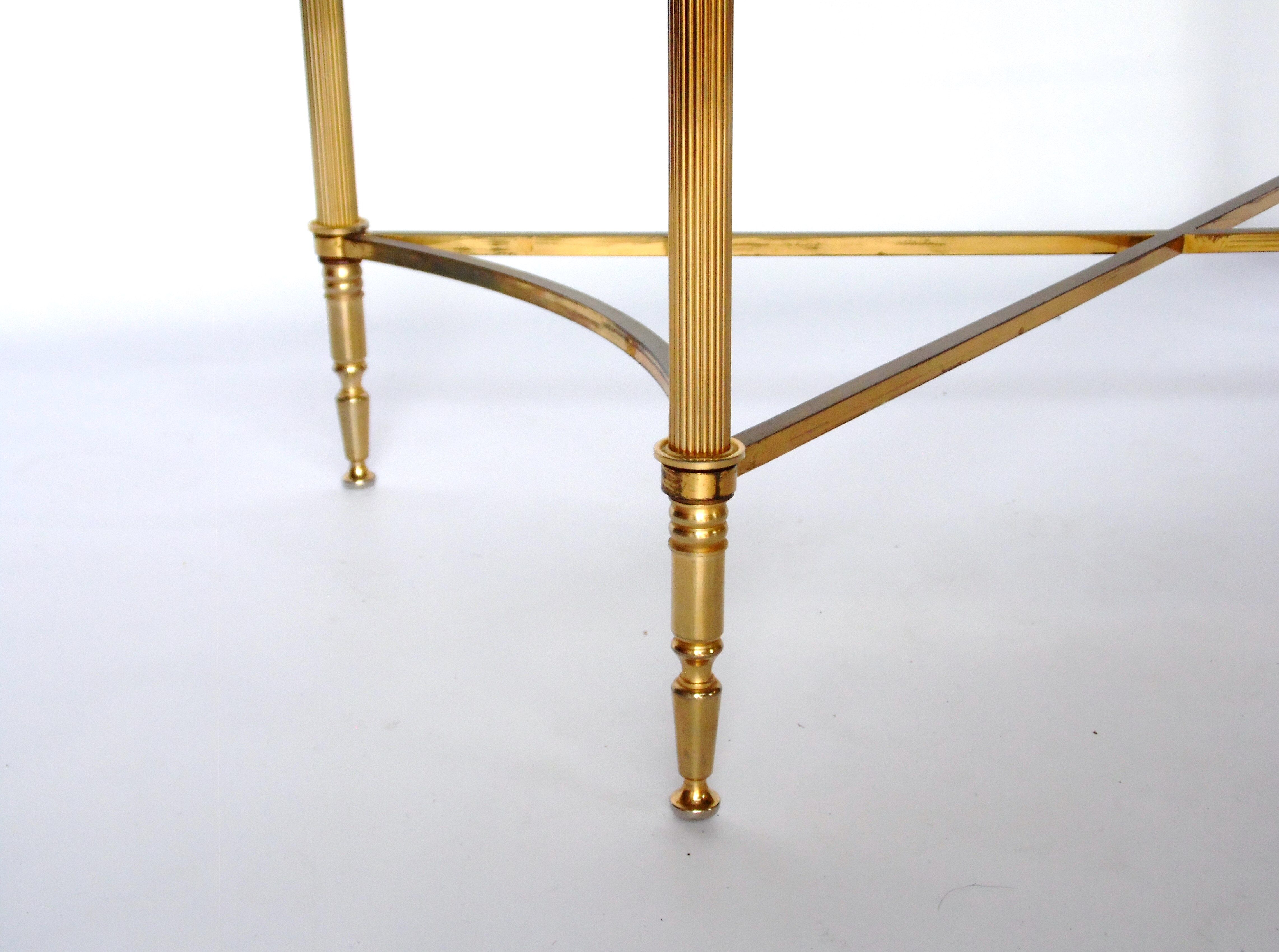 Glass and brass coffee table in the 70s