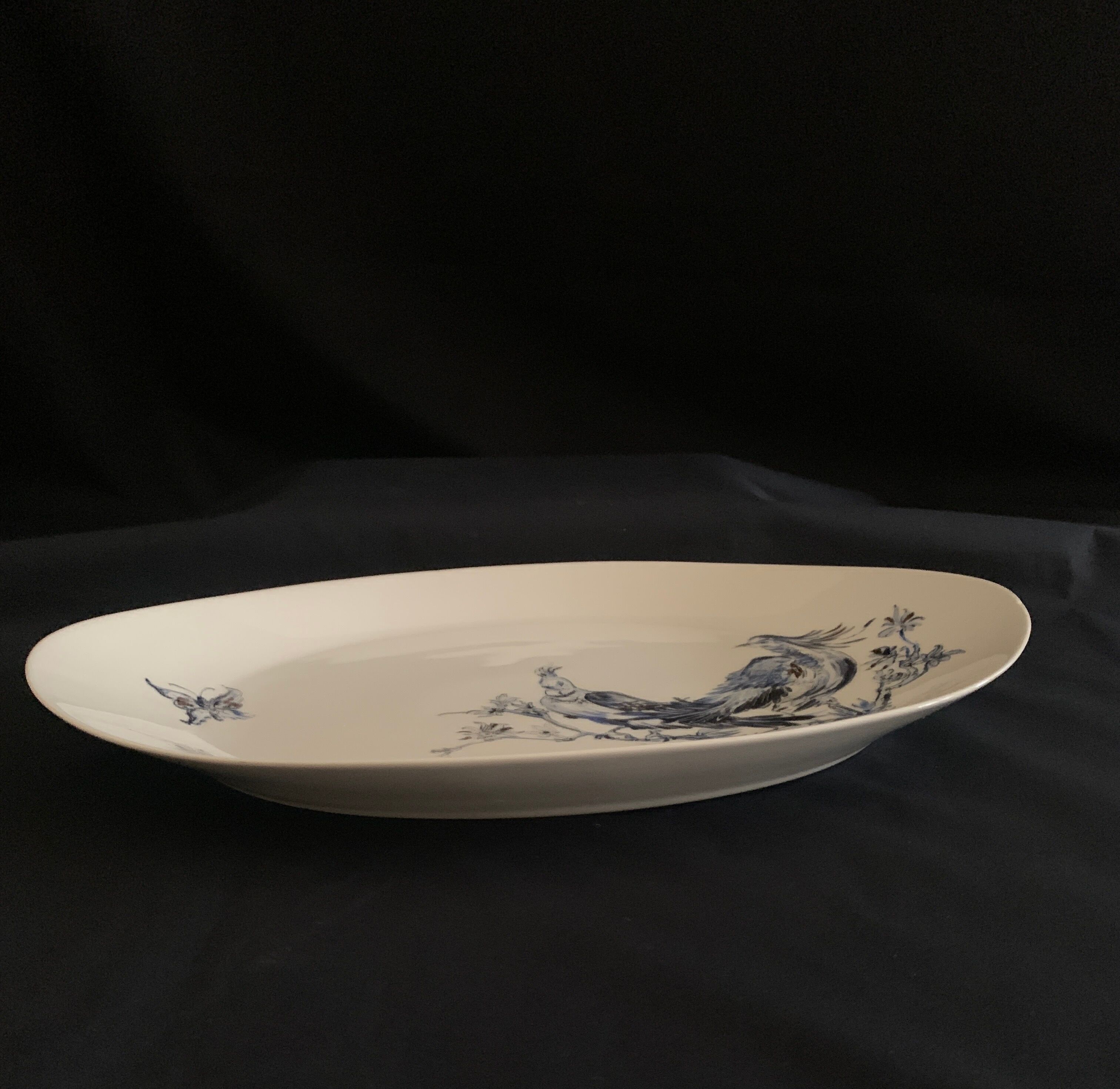 Plate signed Arsberg, "The Buffoon" after a model from the Royal Manufacture of Sèvres.