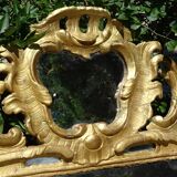Miroir Louis XV bois doré à parecloses