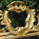 Miroir Louis XV bois doré à parecloses