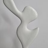 Biomorphic-inspired sculpture, on an industrial wooden base, 37 cm