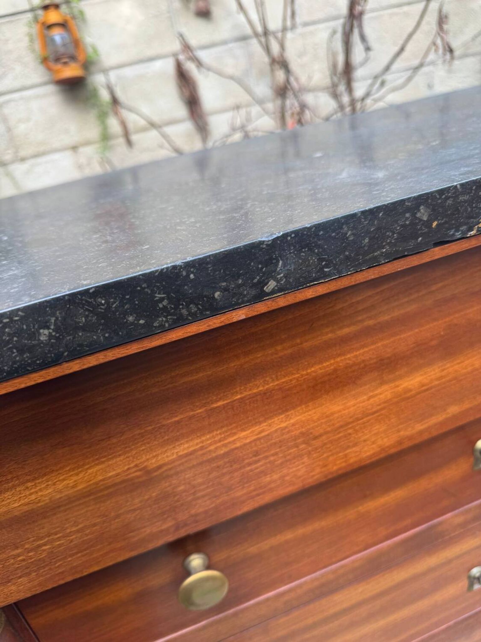 Empire chest of drawers in mahogany and black marble, 19th century