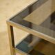 Hollywood Regency coffee table in smoked glass with mirrored framing from the 1970s.