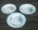 Set of three iron earthenware plates from the St Amandinoise earthenware factory, lily of the valley model.