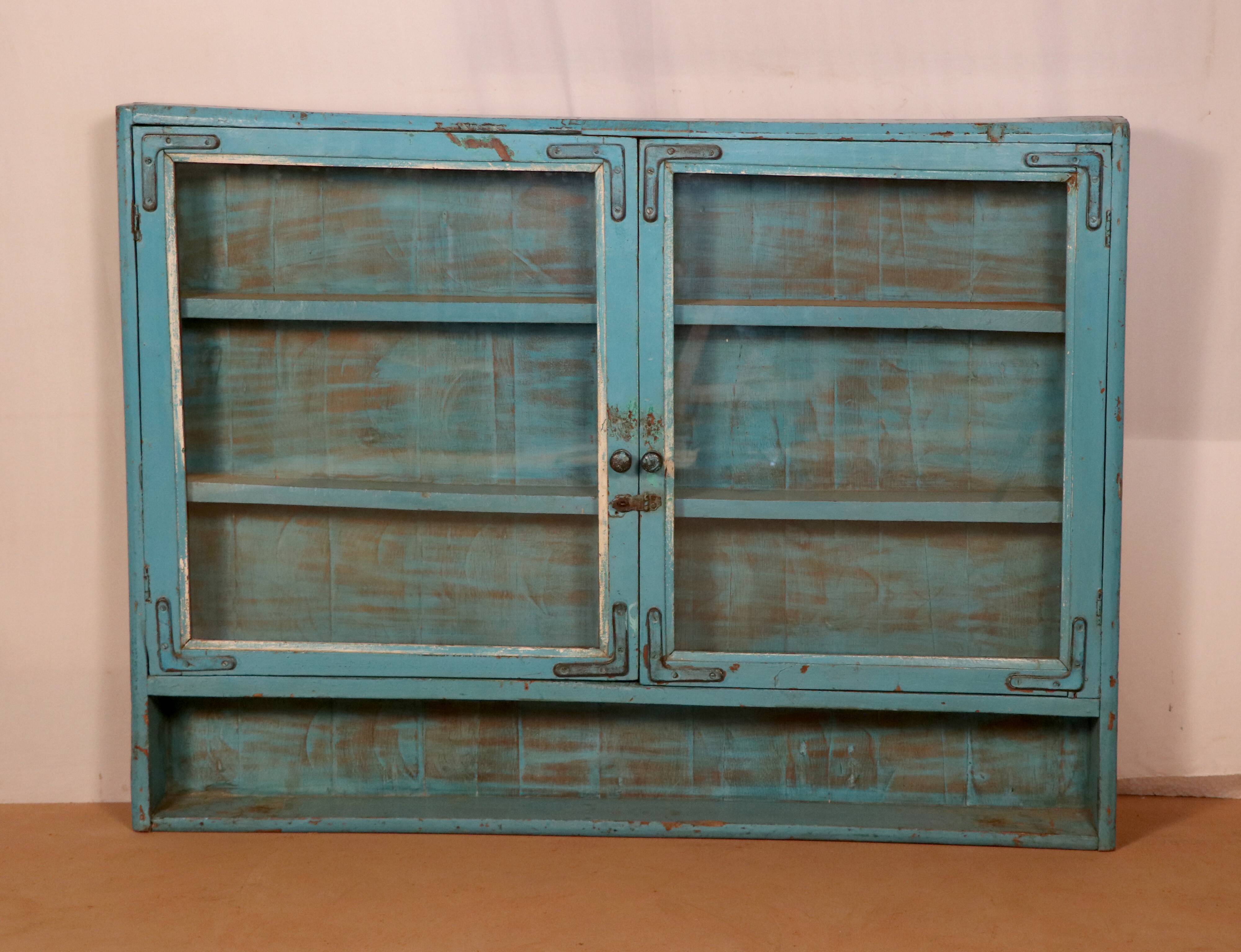Old showcase in original blue patina Burmese teak