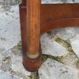 A small piece of Bonheur du jour with detached columns in Empire-era mahogany.