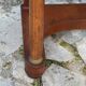 A small piece of Bonheur du jour with detached columns in Empire-era mahogany.