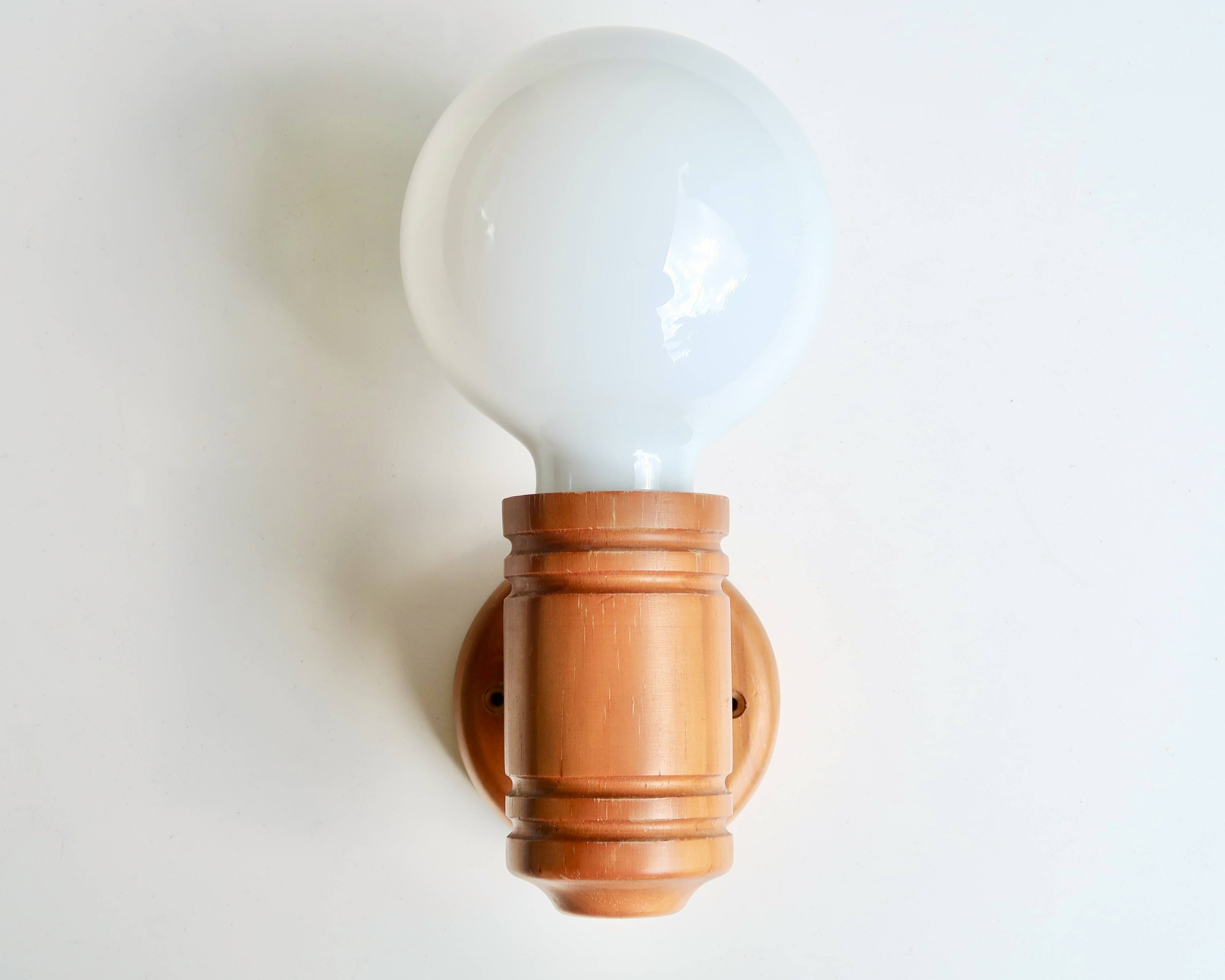 Wall lamp in pine wood and opaque white glass globe, 1970s