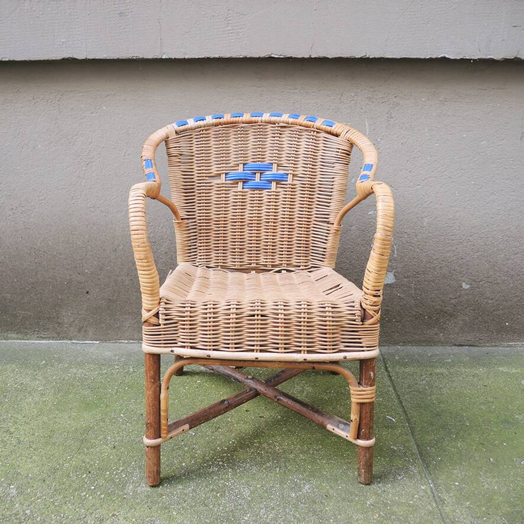 Old wicker chair for children