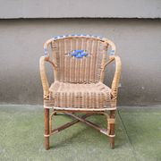 Old wicker chair for children