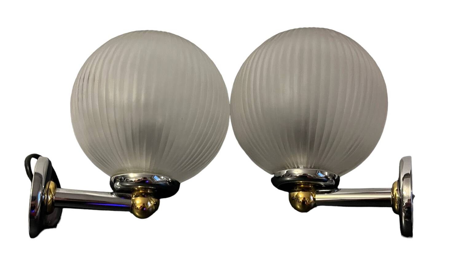 Pair of Inda metal and chiseled glass wall lights