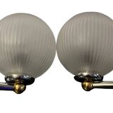 Pair of Inda metal and chiseled glass wall lights