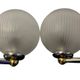 Pair of Inda metal and chiseled glass wall lights