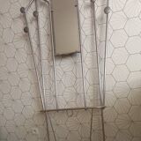 Vintage aluminum wall coat rack.