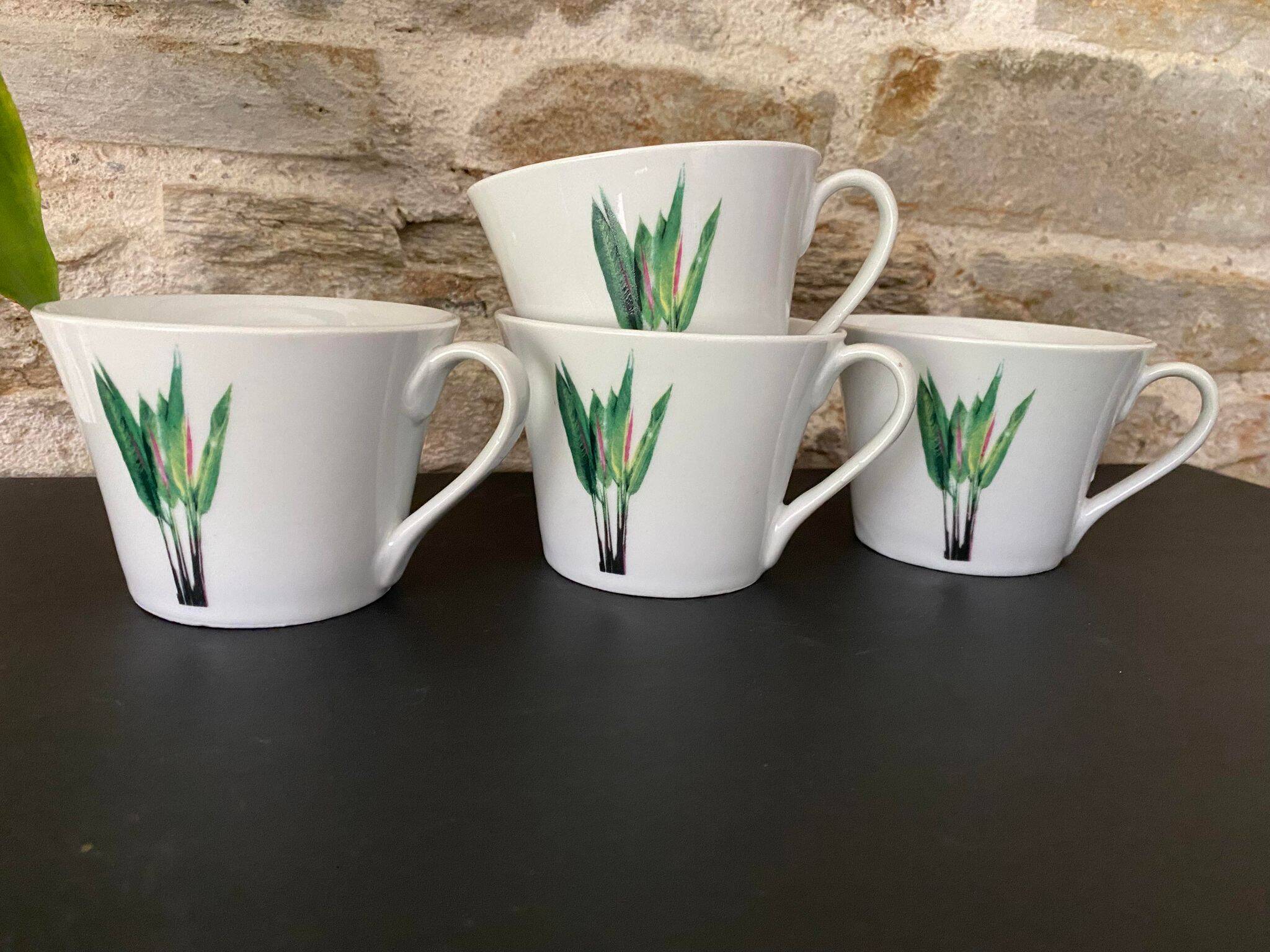 4 fine white porcelain cups with fine flower decoration