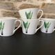 4 fine white porcelain cups with fine flower decoration