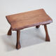French brutalist tree trunk stools