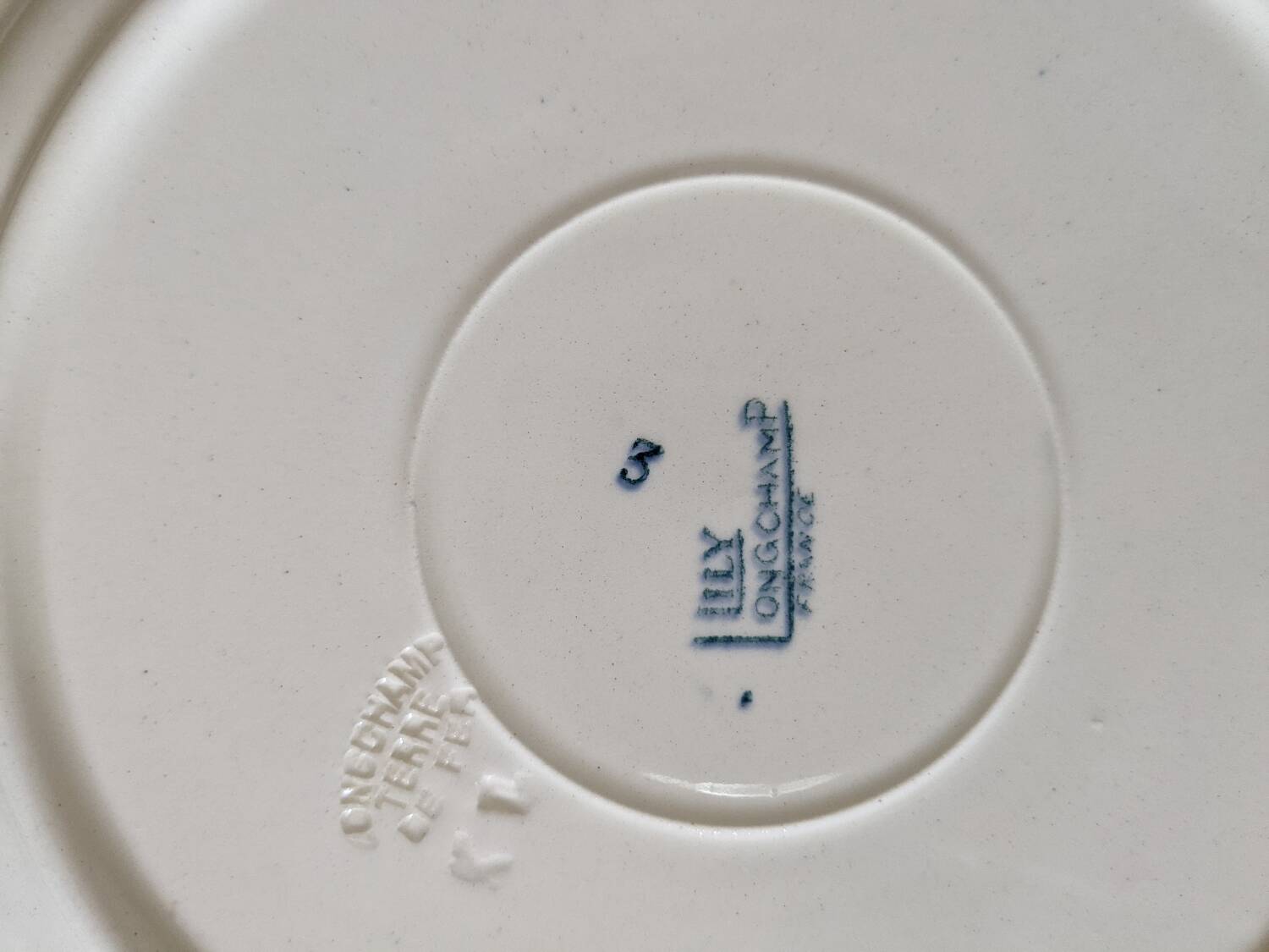 4 Lily Longchamp dinner plates