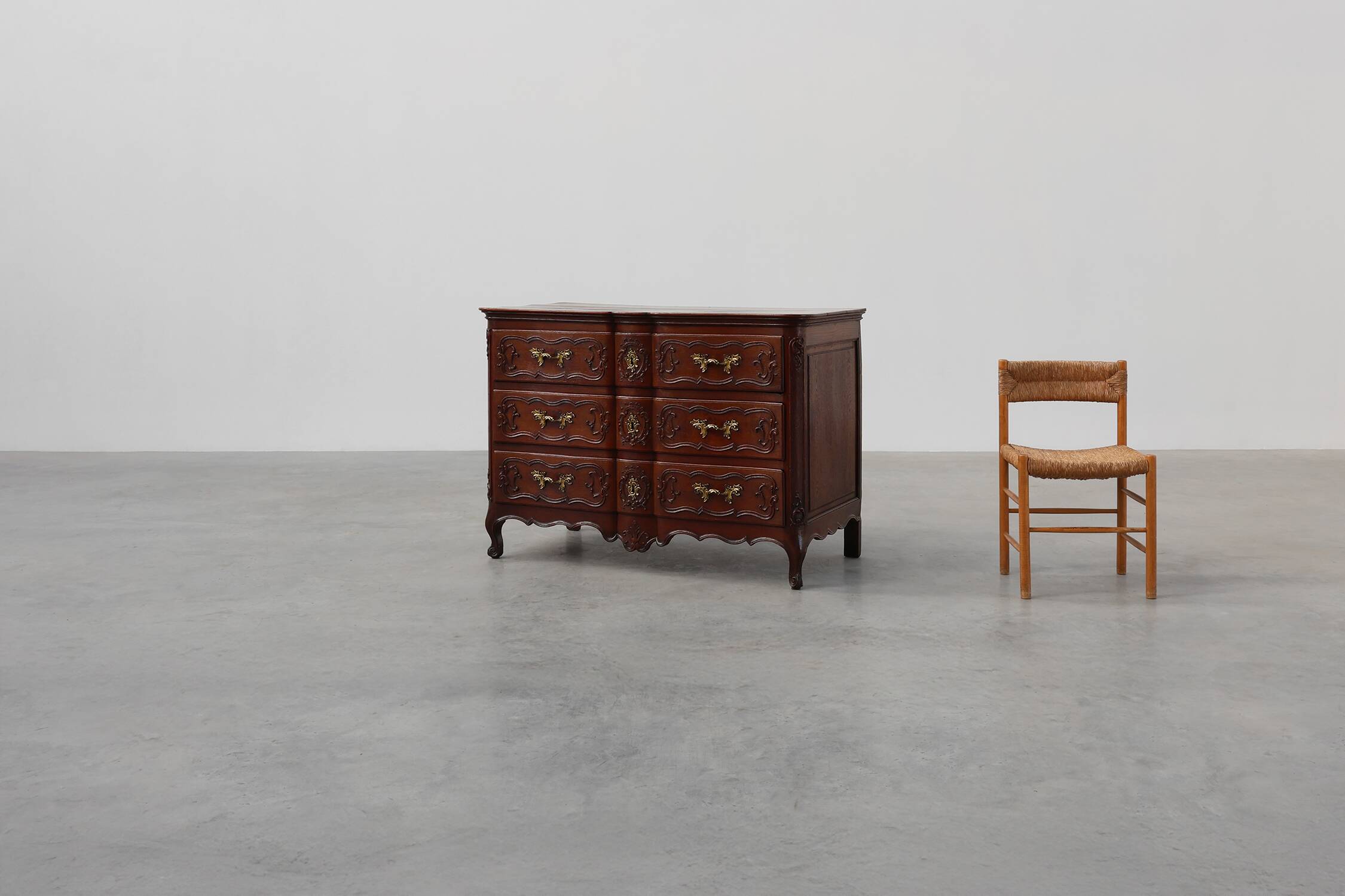 French 18th Century hand crafted oak chest of drawers in Louis XV style