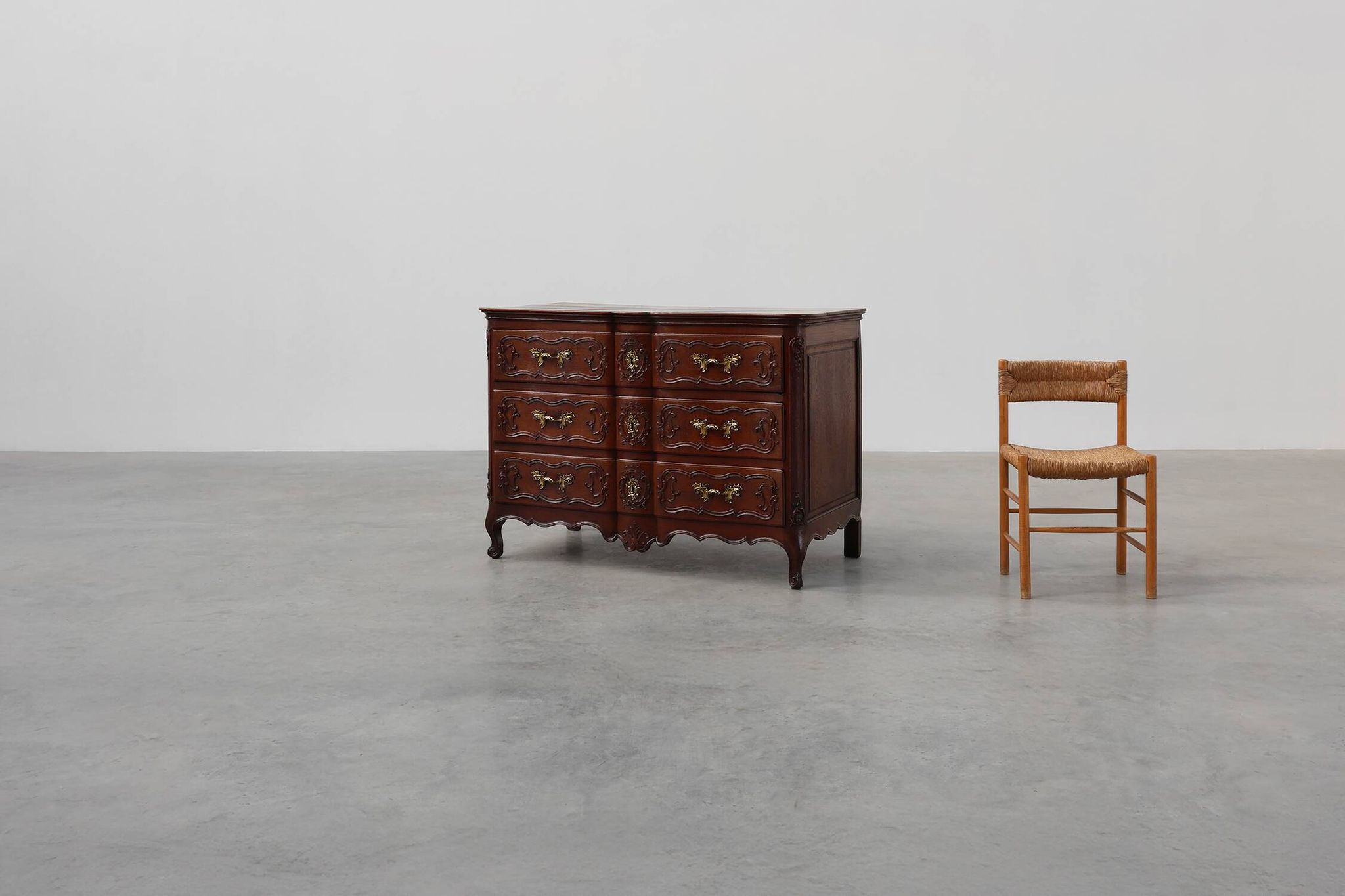 French 18th Century hand crafted oak chest of drawers in Louis XV style