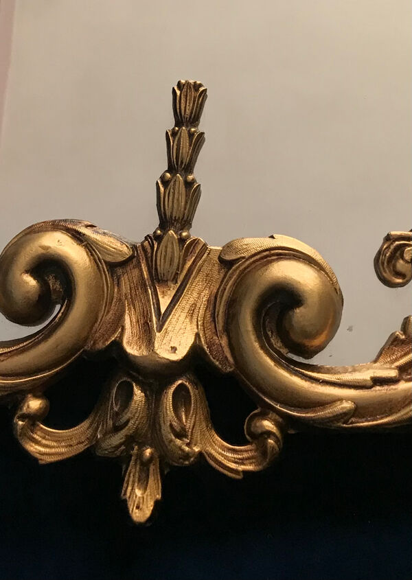 Ancienne miroir en bronze signée