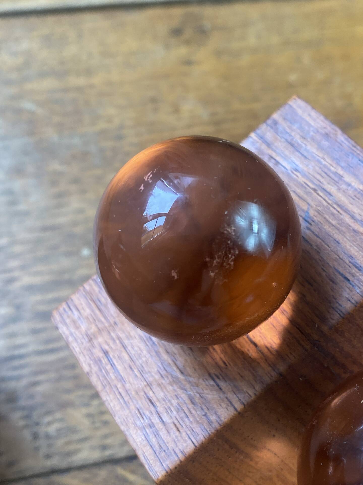 Wooden bookends and spherical glass balls