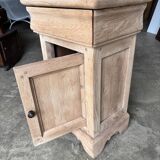 Raw wood bedside table