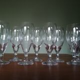 Eight champagne flutes in engraved glass