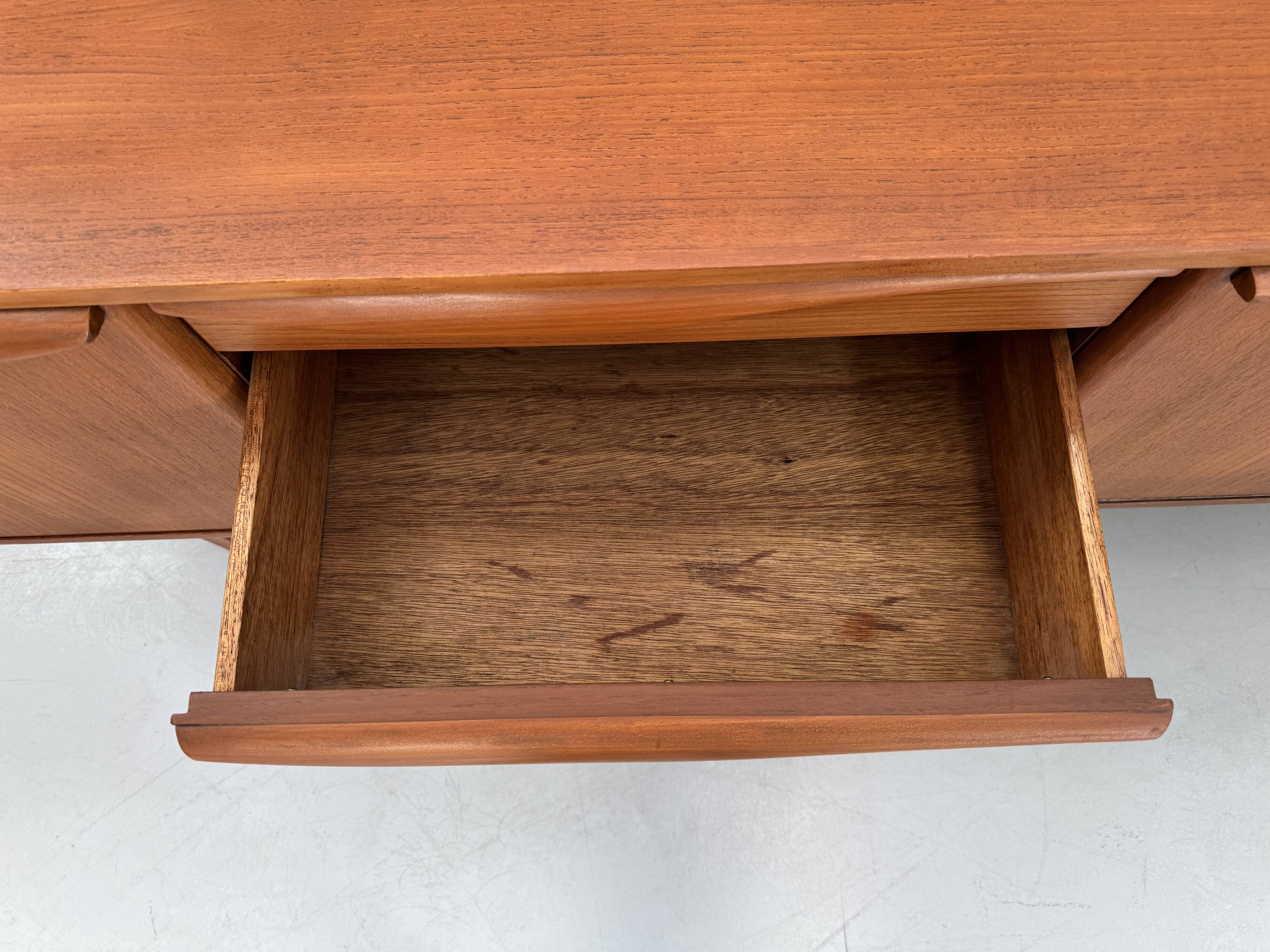 Beautiful and unique Stonehill sideboard from the 1960s made of teak wood.