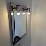 Miroir vintage avec appliques.