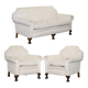 Victorian suite in damask, walnut frame, legs carved in lion's paw.