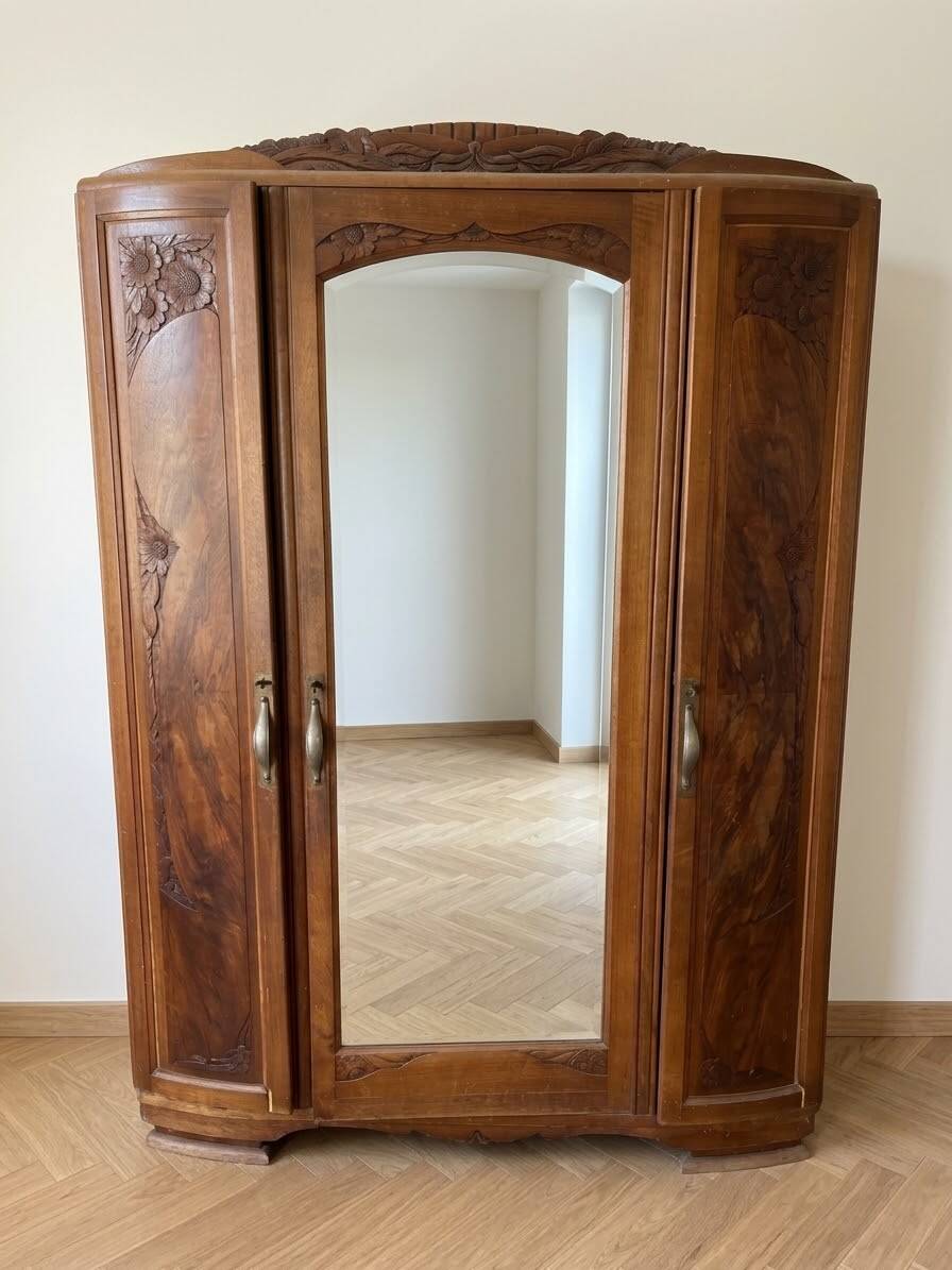 Antique carved wooden wardrobe with mirror