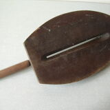 Old wooden bread cutter carved sheaf of wheat and metal deco kitchen Normandy countryside