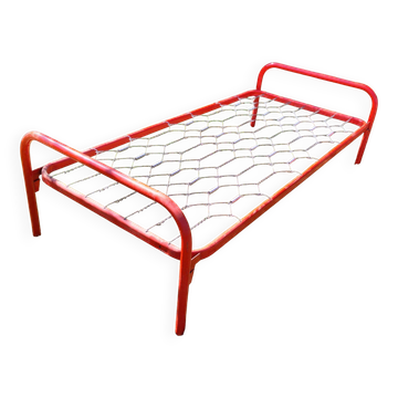 Red metal bed