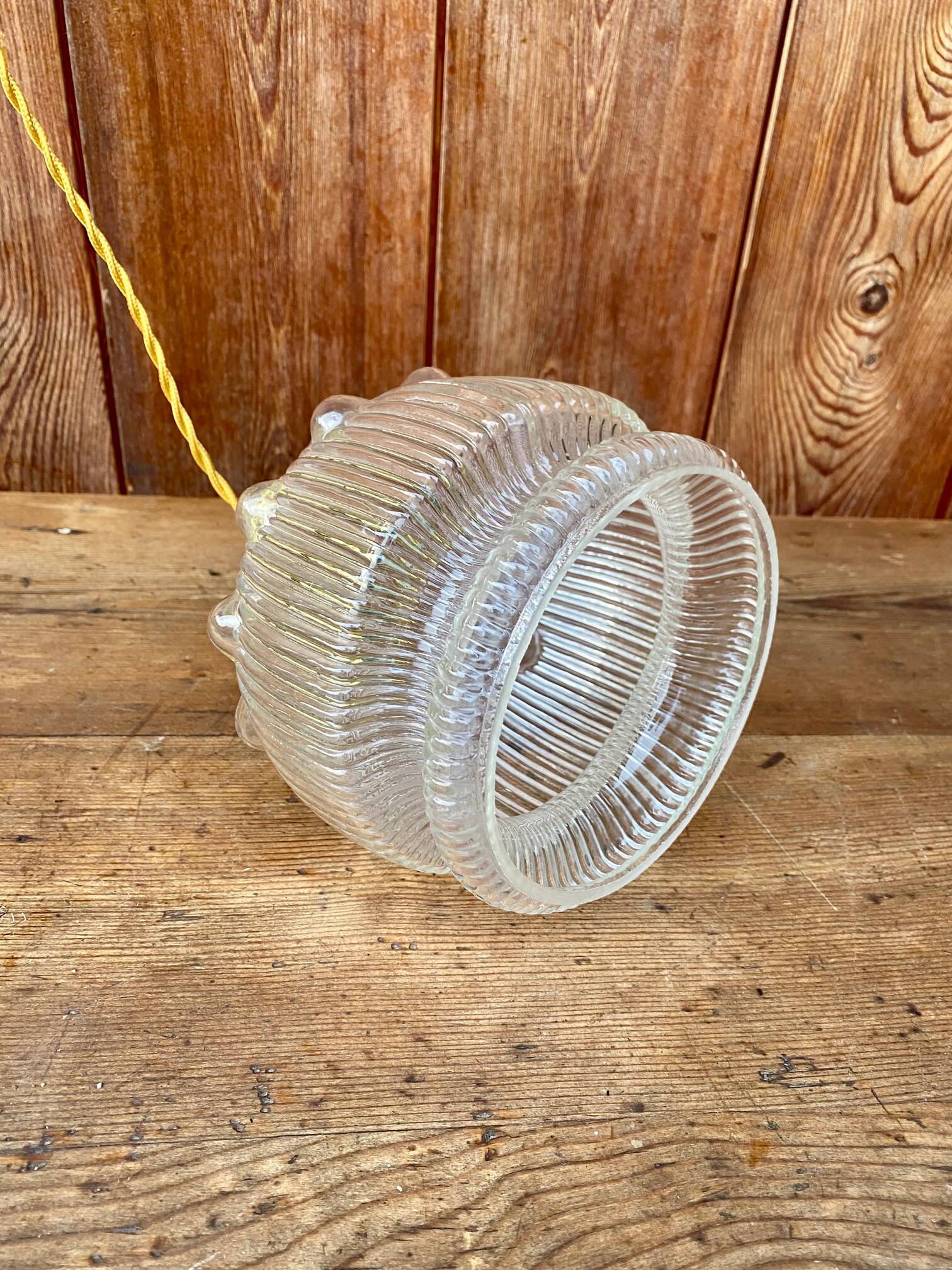 Vintage flower-shaped transparent glass pendant globe.