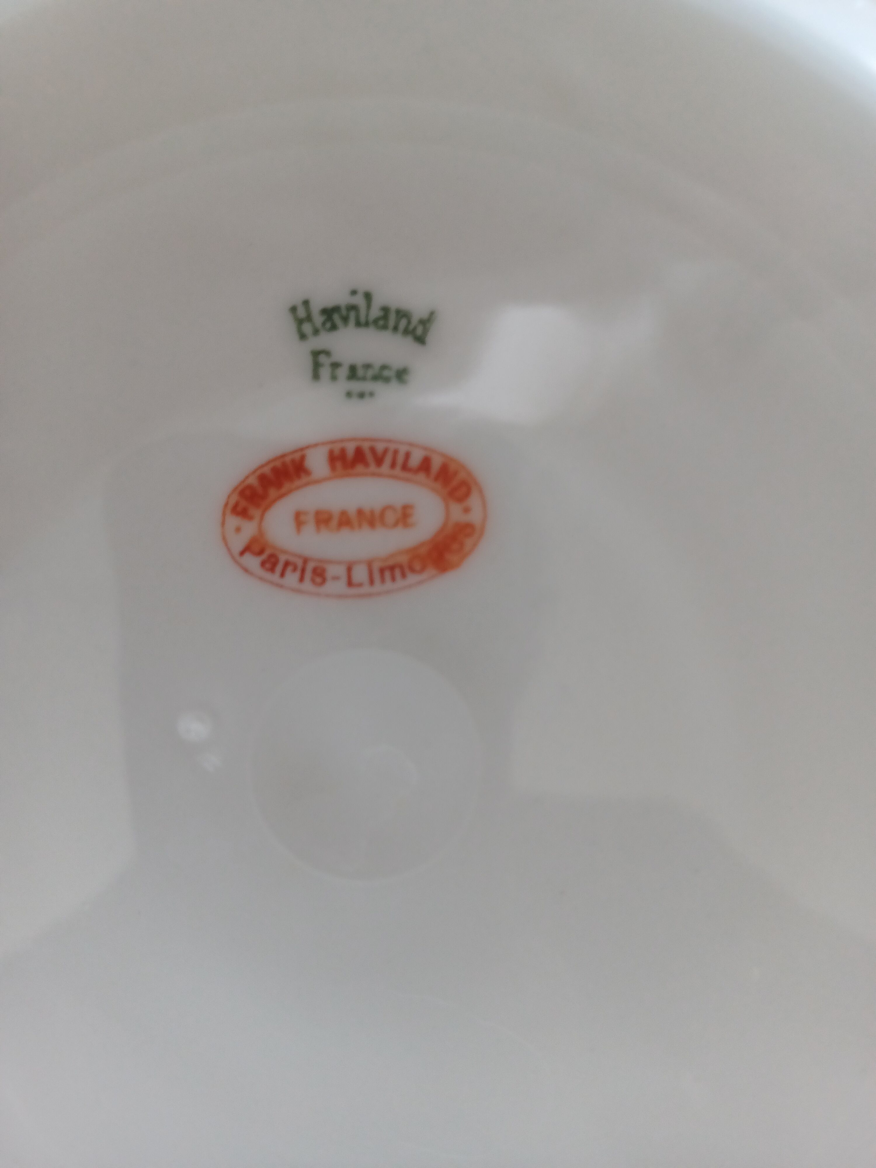 Haviland porcelain plate, contour decorations in floral garland.