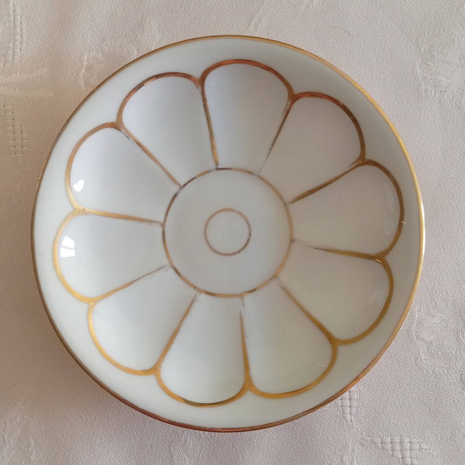 Set of 8 pairs of cups and saucers in Paris porcelain