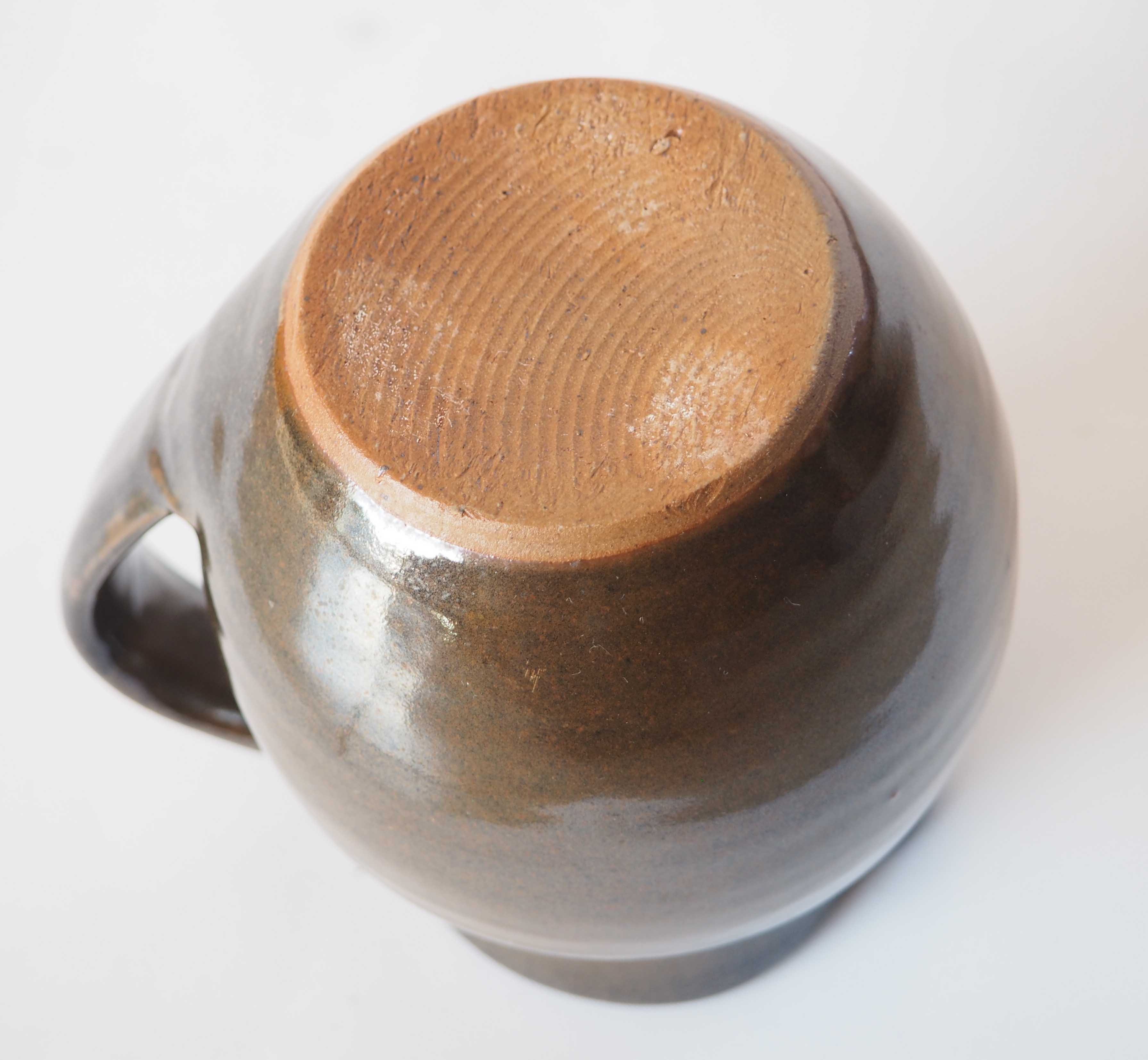 Duo of sandstone pitchers