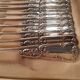 12 teaspoons, floral pattern with lily of the valley, silver metal